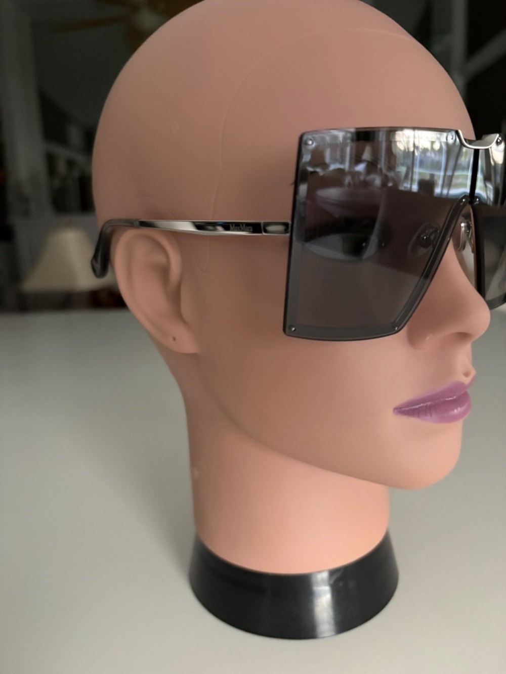 MaxMara Shield Sunglasses in black with grey gradient lenses. Gold hardware